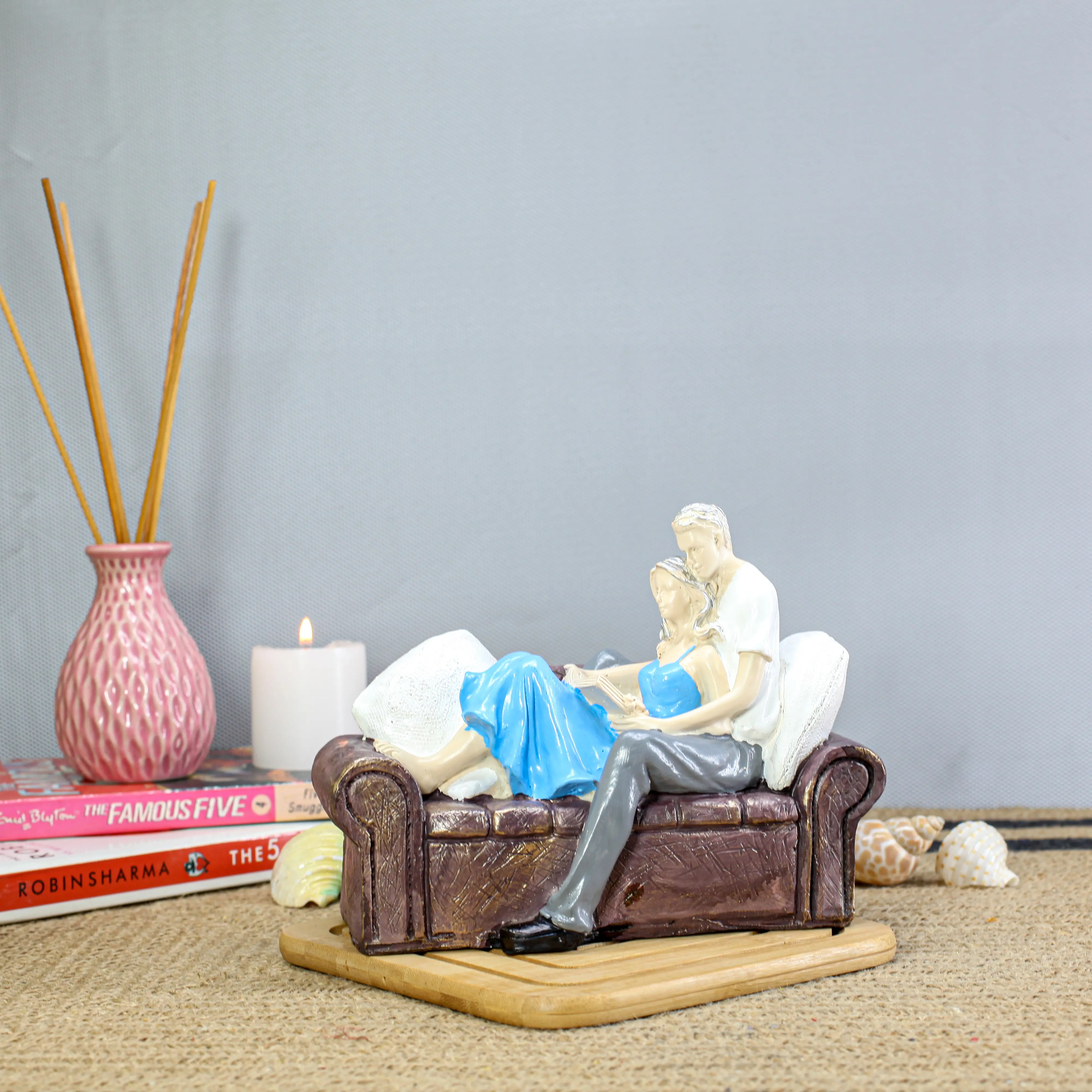 Sofa Couple Reading Book