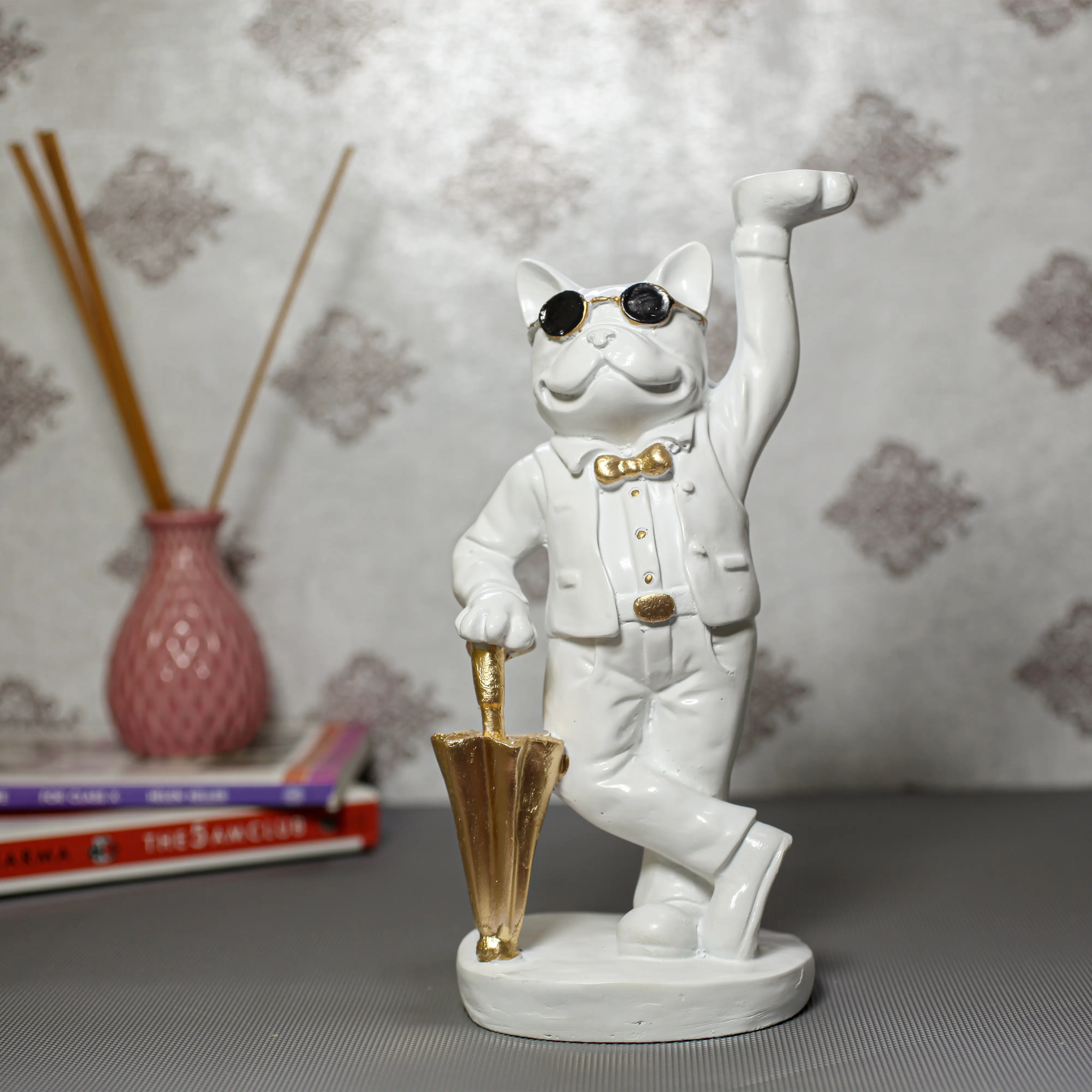 Organize in style with this Standing Dog Butler Statue. Featuring a durable resin dog holding a serving platter for keys, candy, or jewelry. The perfect functional decor. Shop now!